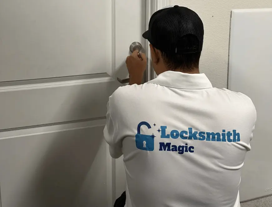 Locksmith Magic technician rekeying a residential door lock