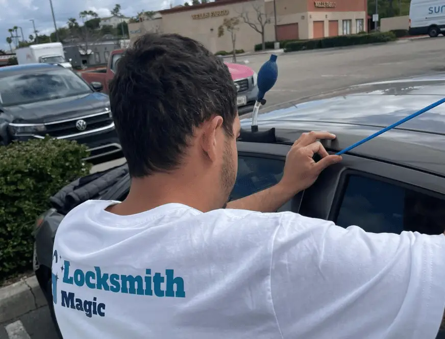 Emergency locksmith unlocking car door in San Diego